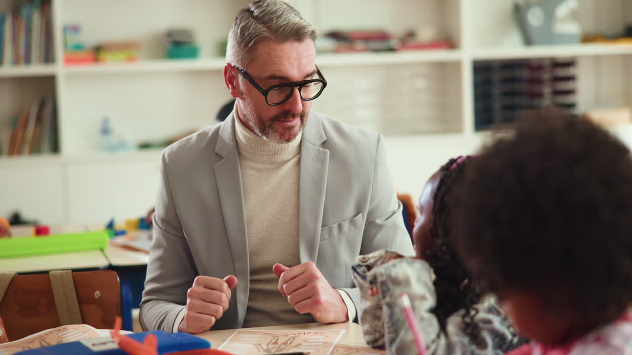 Teacher High-Fiving Students in Classroom