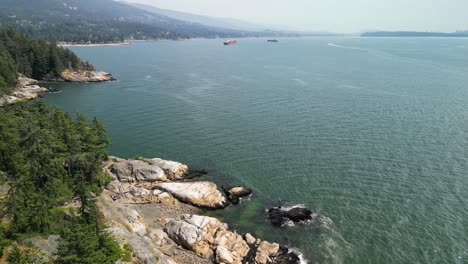 Aerial-view-of-Vancouver-and-shipping-boats-from-Lighthouse-Park,-West-Vancouver,-British-Columbia,-Canada