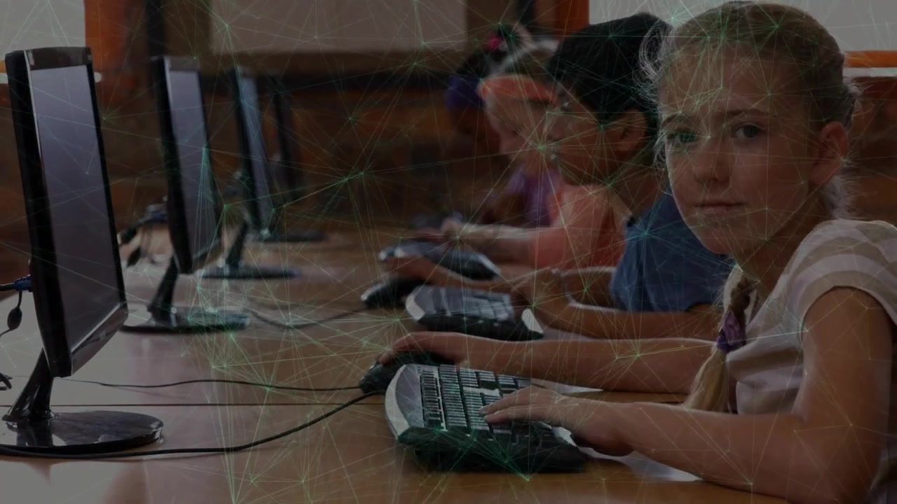 upon loading assignment, students typing keyboards and clicking mice in lab celebrating success