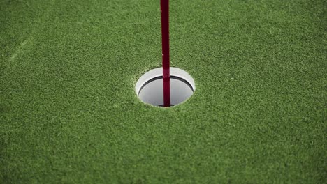 static-close-up-shot-of-a-golf-hole