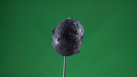 arándanos girando con bucle en pantalla verde para la llave de croma