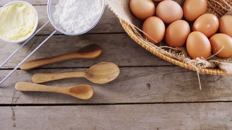 brown eggs and baking soda on wooden table 4k