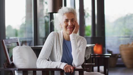 portrait of senior mixed race woman looking at camera and smiling