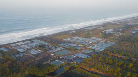 Salt-making-pools-in-Indonesia,-aerial-drone-view