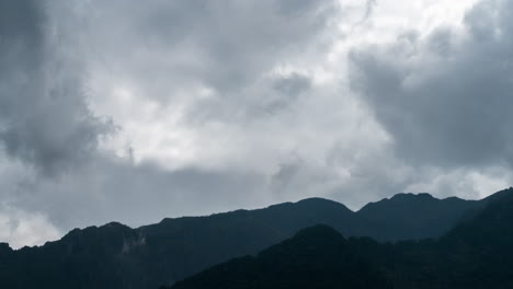 moody clouds time lapse over cangshan mountains in yunnan, china