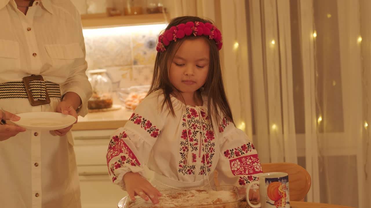 Mother and Daughter Preparing for Christmas Celebration