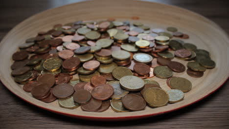 coins falling into a pile - euro cents