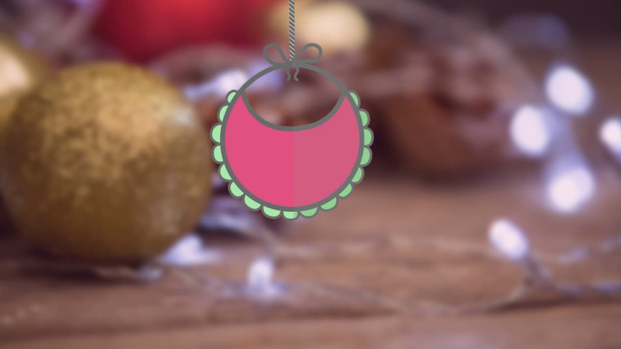 una pelota de bauble en una tabla de madera, con un bib colgado en un canal alfa