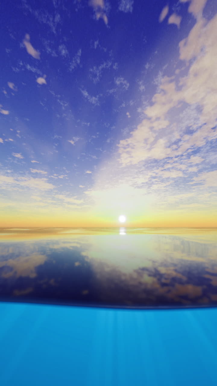 Vibrant sunset reflecting over calm ocean waters on a clear evening