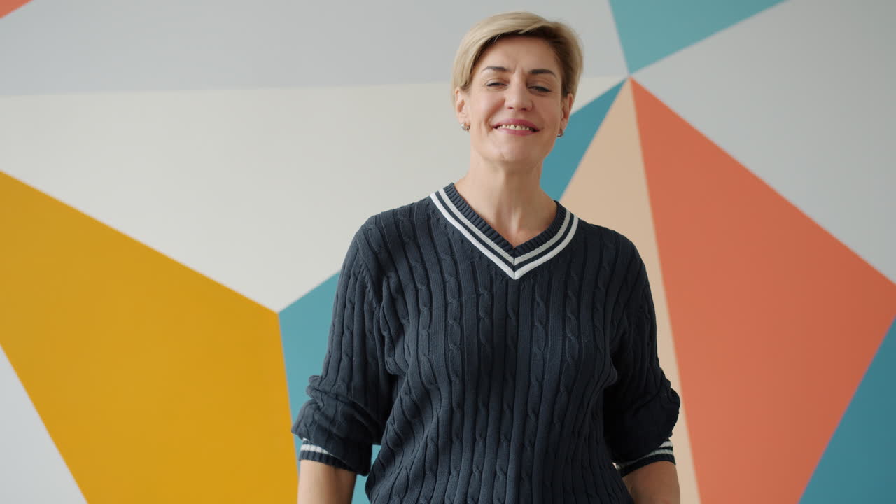 Smiling Woman with a Friendly Gesture