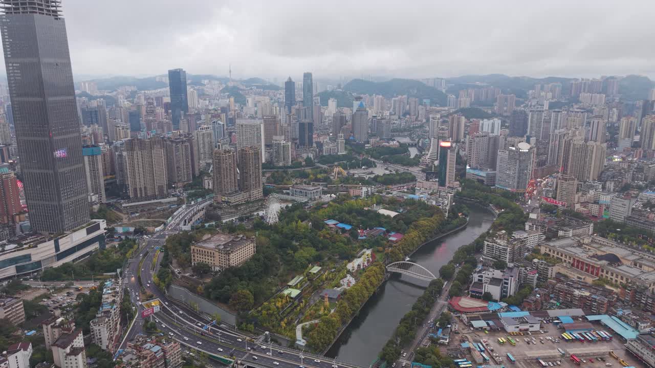 Revealing drone shot of Guiyang’s dense urban layout in Guizhou Province. China