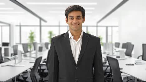 happy indian businessman smiling with a big smile