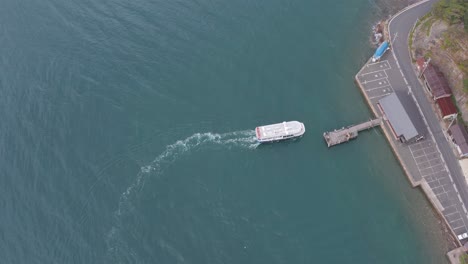 Tourism-Boat-Pulls-Into-Harbor-at-Ine,-Kyoto-Japan