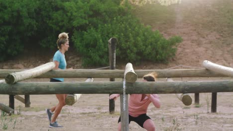 caucasian woman exercising at bootcamp