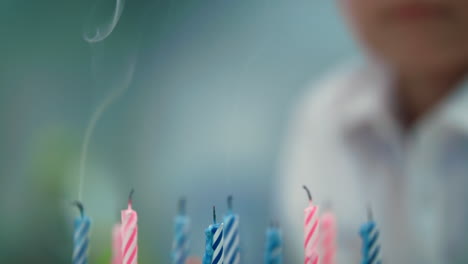 Birthday-candles-smoke-rising-in-slow-motion.-End-of-happy-birthday-party