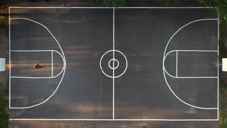 A-top-down-view-directly-above-a-basketball-court-in-a-park-on-Long-Island,-NY