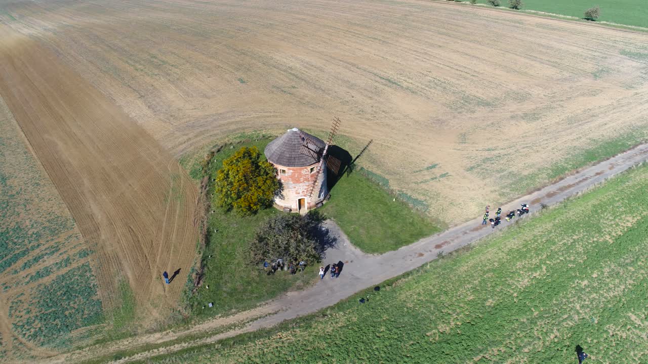 Aerial View of a Historic Windmill in a Rural Landscape