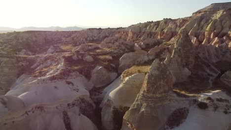 Drone-breathtaking-view-of-Cappadocia-rose-red-valley-for-sunset