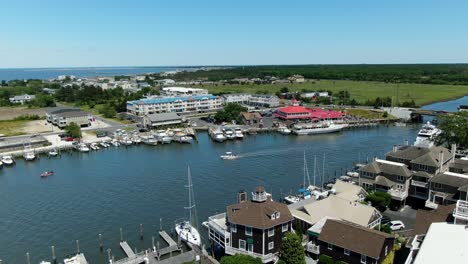 aerial slow motion lewes canal, delaware with cruise ships moored