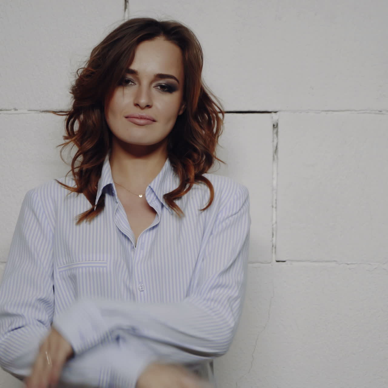 Woman in a Striped Shirt