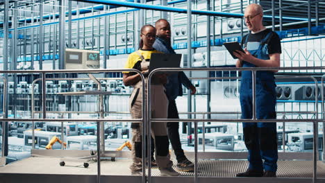 industry 4.0 photovoltaics plant manager overseeing work done by employees