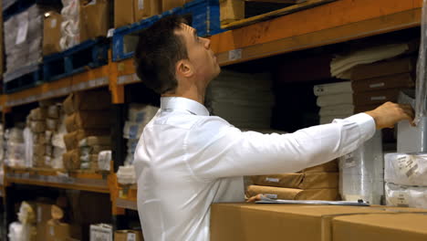 supervisor checking products at warehouse