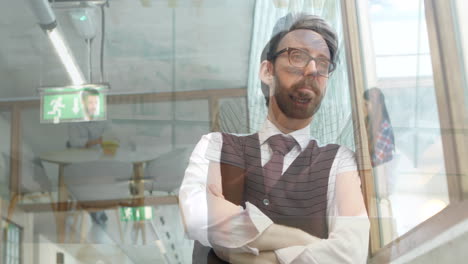 animation of businessman looking out of window over man and woman sitting in white room