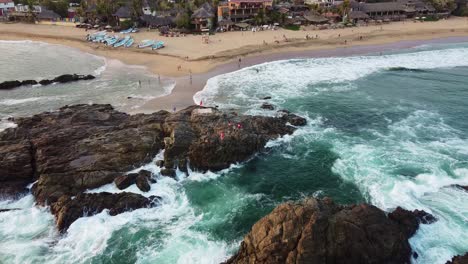 waves crashing down in the pacific ocean, oaxaca