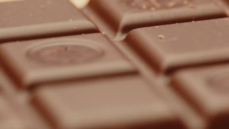 beautiful macro dolly of cubes of dark chocolate tablet