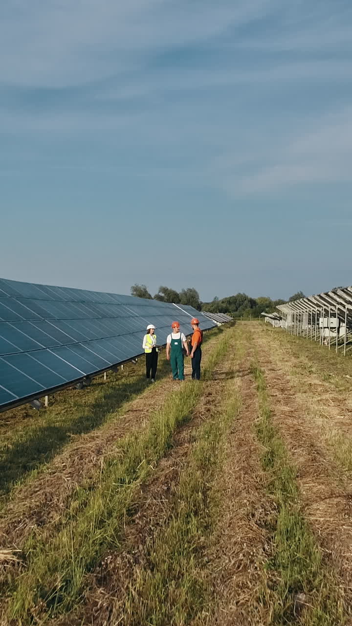 Solar panel technicians vertical video