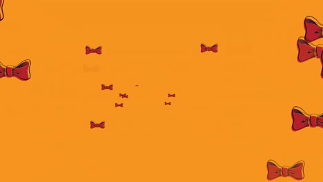 Animation-of-bow-ties-floating-over-orange-background