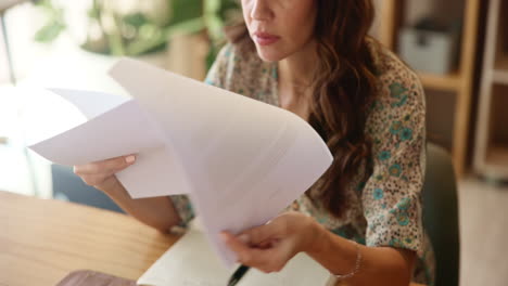 woman focused on documents