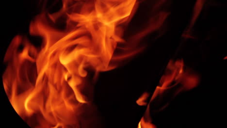 dynamic orange flames against a dark background