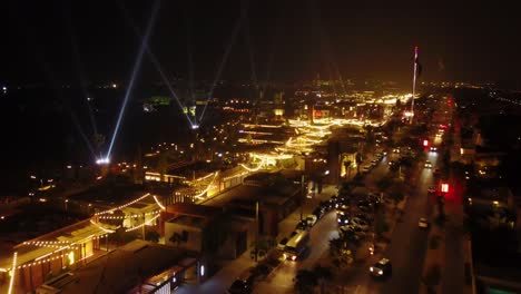 night view of a vibrant city illuminated entertainment district