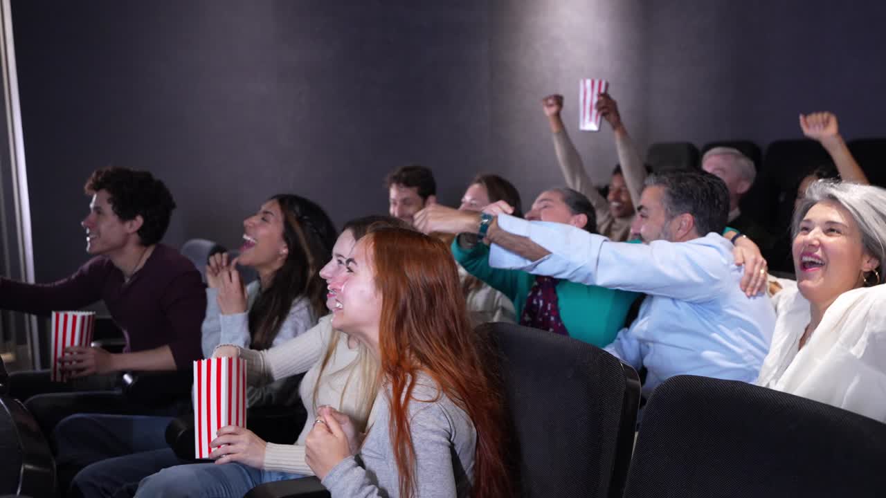 Excited Audience at the Movie Theater