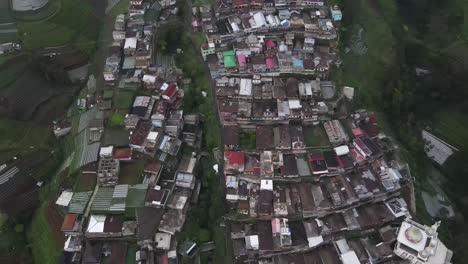 Aerial-view-of-rows-of-houses-in-Nepal-van-java-which-is-a-tourist-village-on-the-slopes-of-Mount-Sumbing,-Magelang,-Central-Java