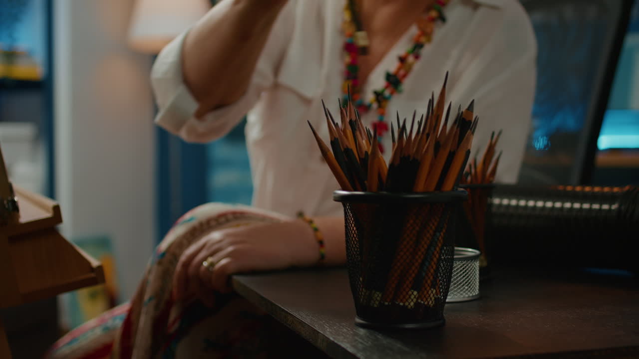 Colorful pencils and artistic tools on table used to draw sketch
