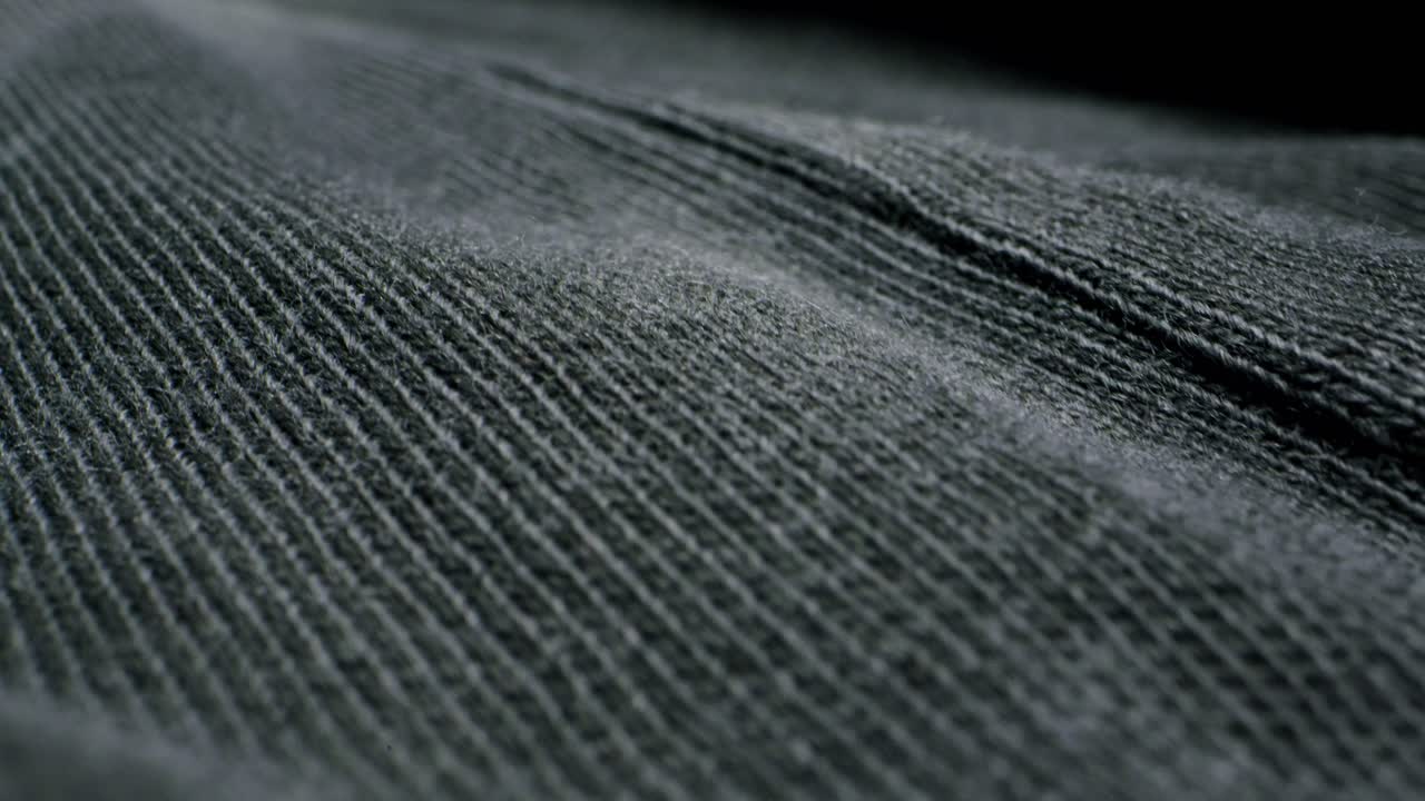 Closeup of an expertly tailored suit that beautifully showcases its sophisticated buttons and fine fabric texture