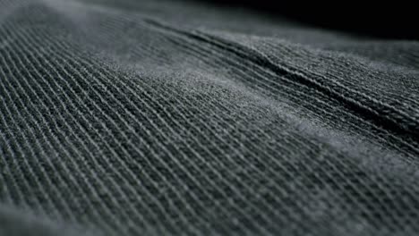 closeup of an expertly tailored suit that beautifully showcases its sophisticated buttons and fine fabric texture