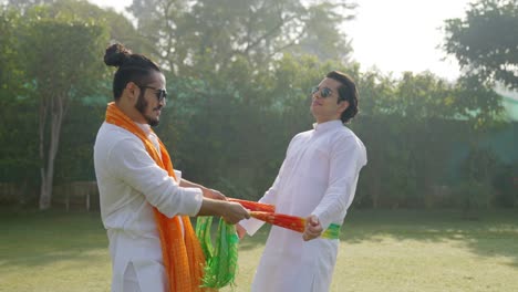 Indian-men-dancing-at-a-park-in-traditional-wear