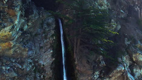 drone shot of mcway falls waterfall on scenic coastline at big sur state park off pacific coast highway in california 6