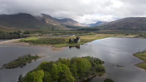 Aerial-view-of-Kilchurn-Castle:-Abandoned-Scottish-fortress-on-a-misty-lake