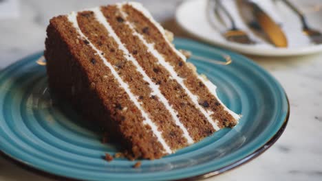 slice of carrot cake on plate