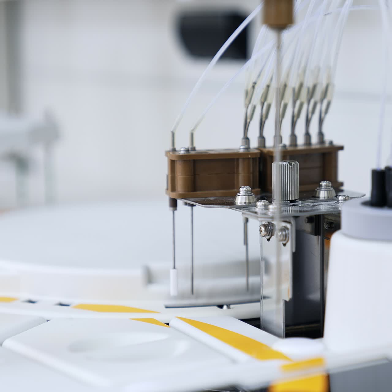Device parts are moving going up and down. Close up. Technological equipment working in the advanced laboratory for medical testing