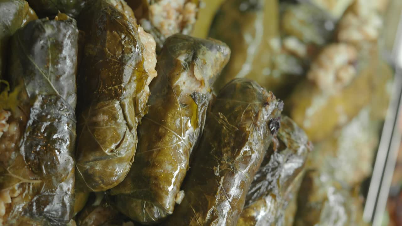 Close-up of traditional stuffed grape leaves (Dolma)