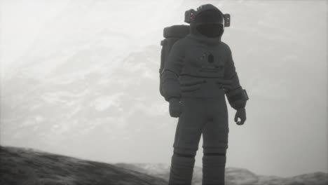 astronaut on another planet with dust and fog