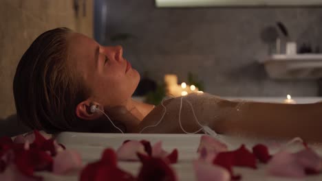 caucasian woman taking bath in hotel