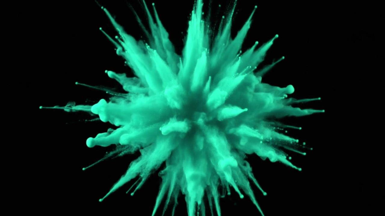 Turquoise Powder Explosion Isolated on Black Background