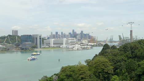 aerial static shot of singapore sentosa island view of bay pier sea with cruise yacht static shot