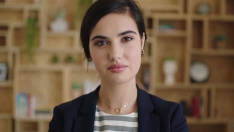 close up portrait of young beautiful woman intern smiling pensive looking at camera